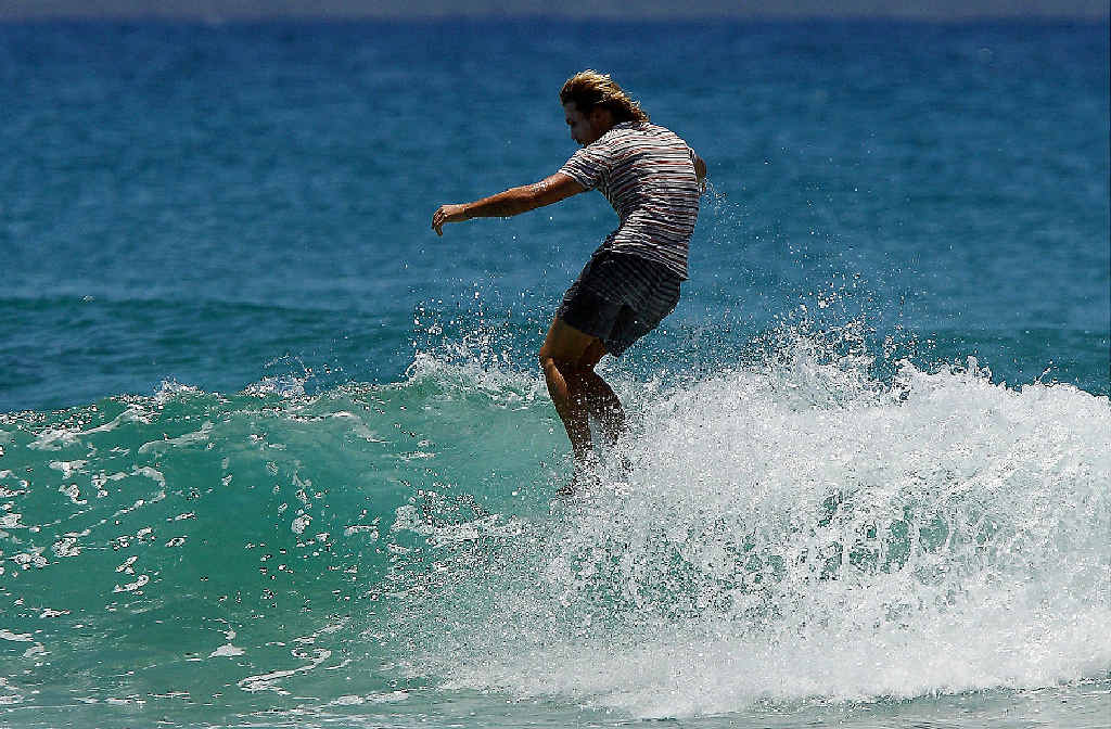 LEFT: Jeremy doing his thing up the tip. LEFT: Jeremy doing his thing up the tip.